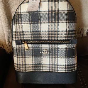 NWT. Coach navy blue and tan plaid backpack